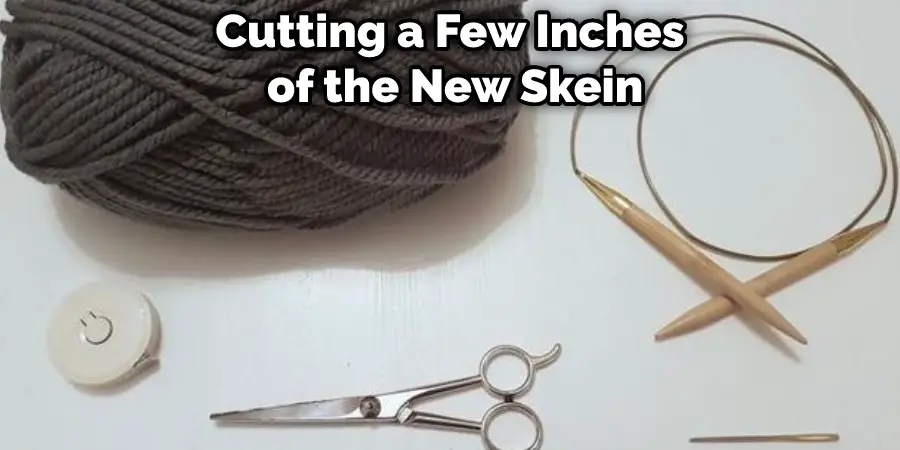 Cutting a Few Inches of the New Skein