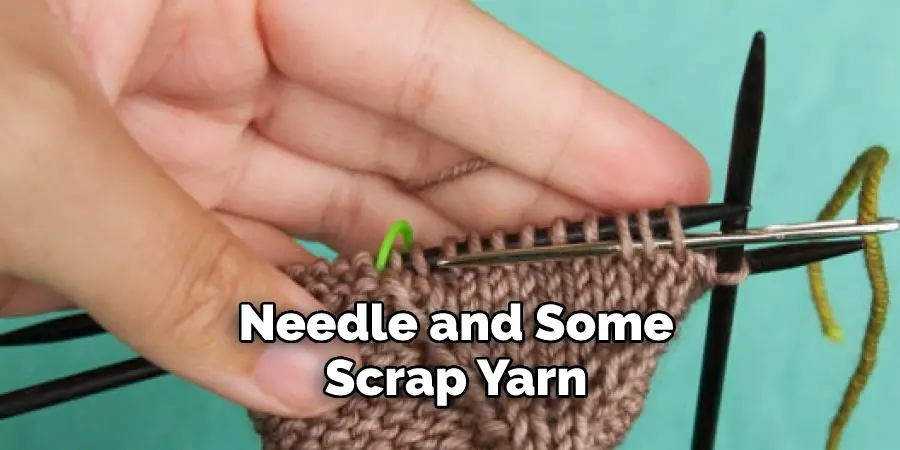  Needle and Some Scrap Yarn