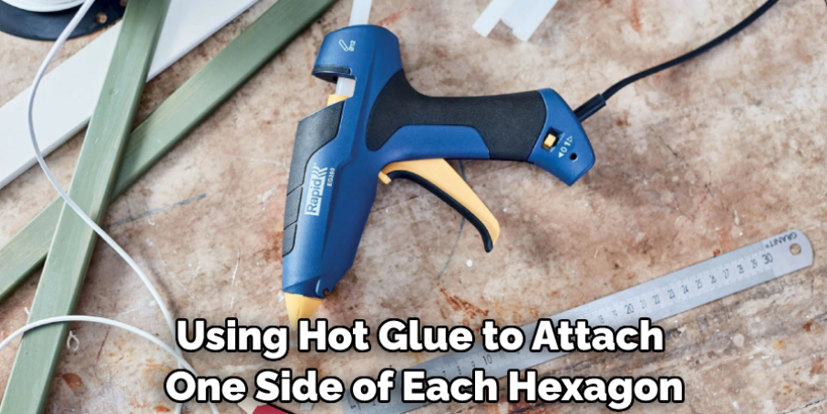 Using Hot Glue to Attach One Side of Each Hexagon