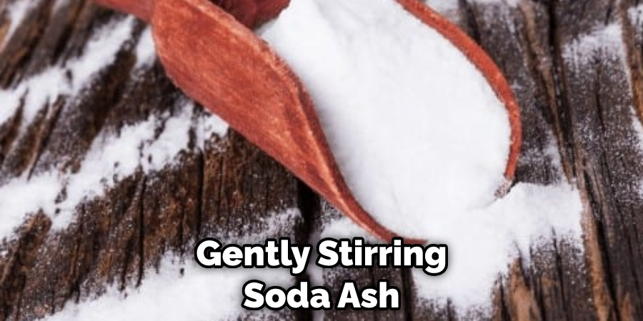 Gently Stirring Soda Ash