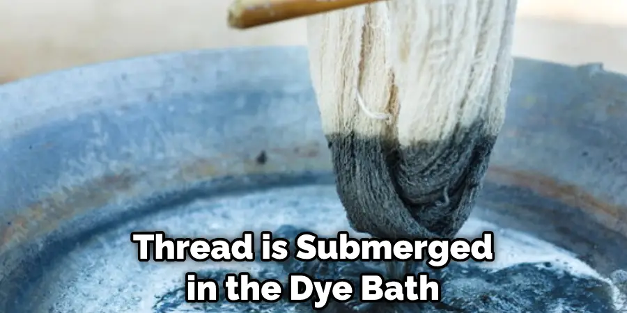 Thread is Submerged in the Dye Bath