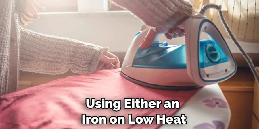 Using Either an Iron on Low Heat