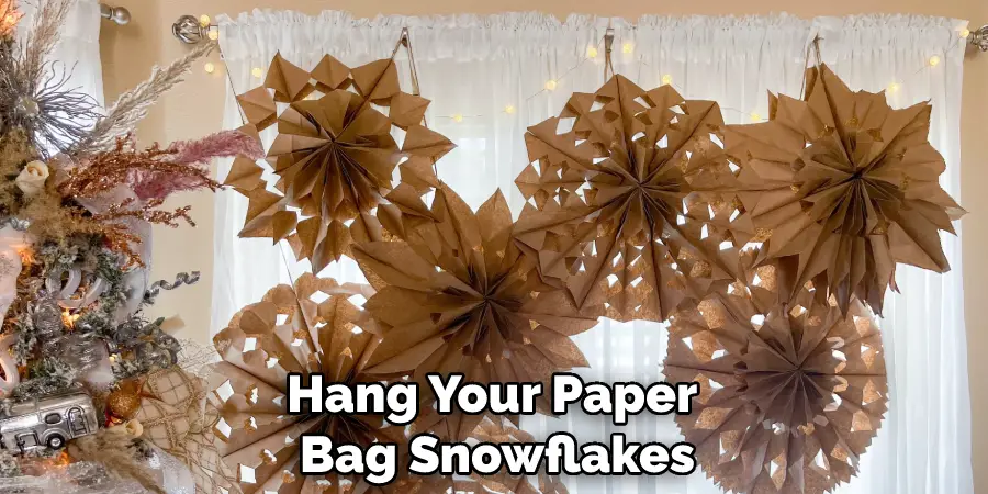 Hang Your Paper Bag Snowflakes