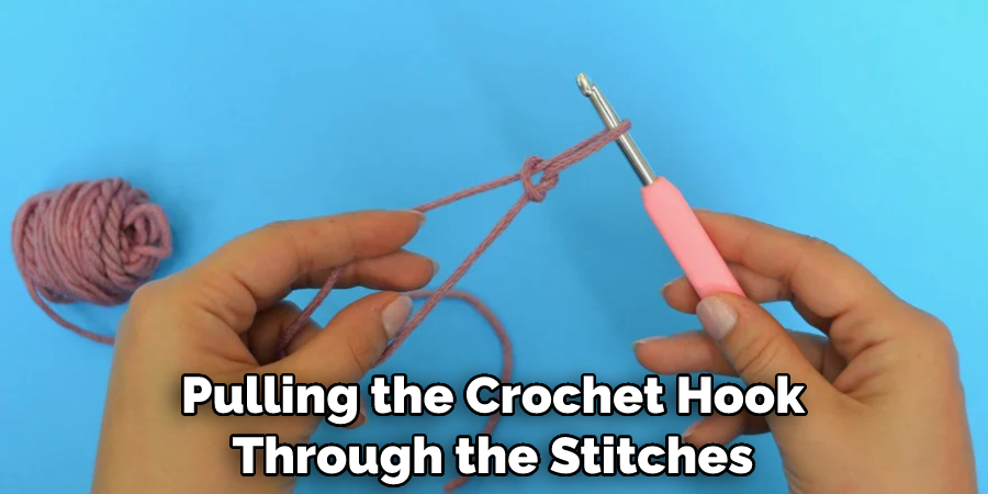 Pulling the Crochet Hook Through the Stitches