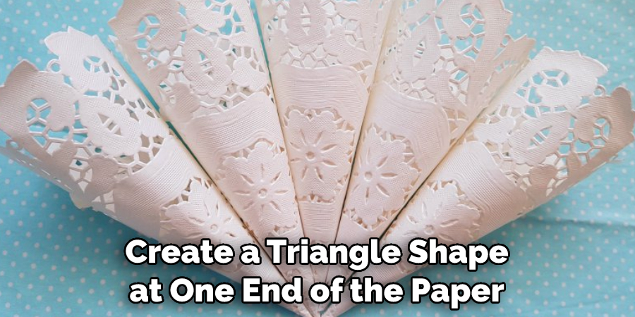 Create a Triangle Shape at One End of the Paper
