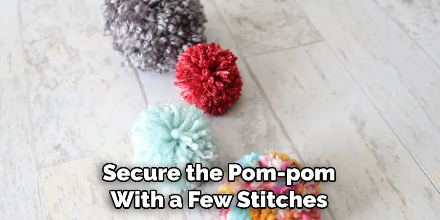 Secure the Pom-pom With a Few Stitches