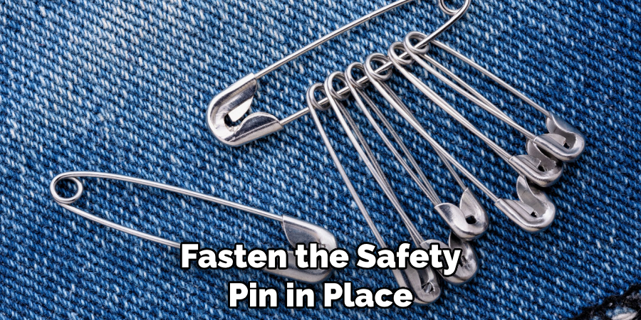 Fasten the Safety Pin in Place