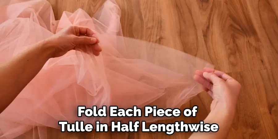 Fold Each Piece of Tulle in Half Lengthwise
