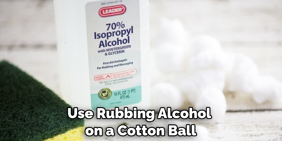 Use Rubbing Alcohol on a Cotton Ball