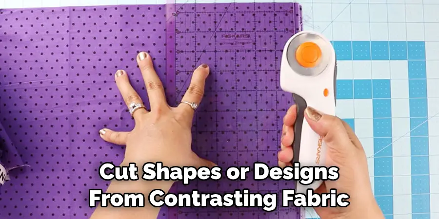 Cut Shapes or Designs From Contrasting Fabric
