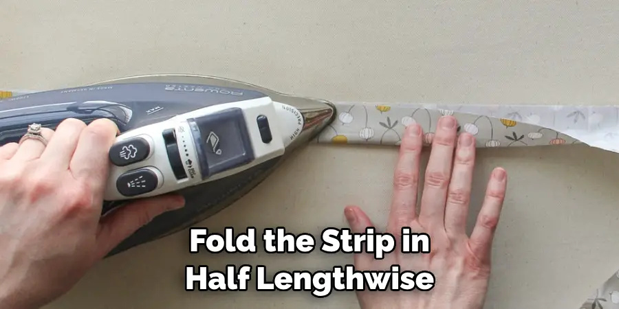 Fold the Strip in Half Lengthwise