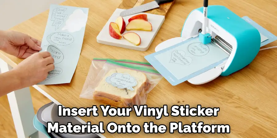 Insert Your Vinyl Sticker Material Onto the Platform