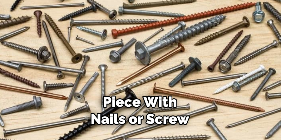 Piece With Nails or Screw