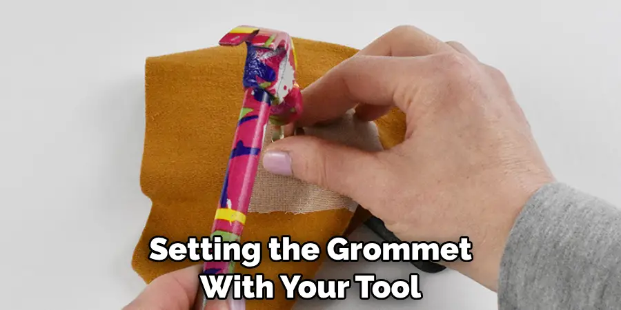 Setting the Grommet With Your Tool