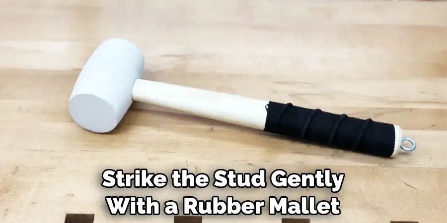 Strike the Stud Gently With a Rubber Mallet