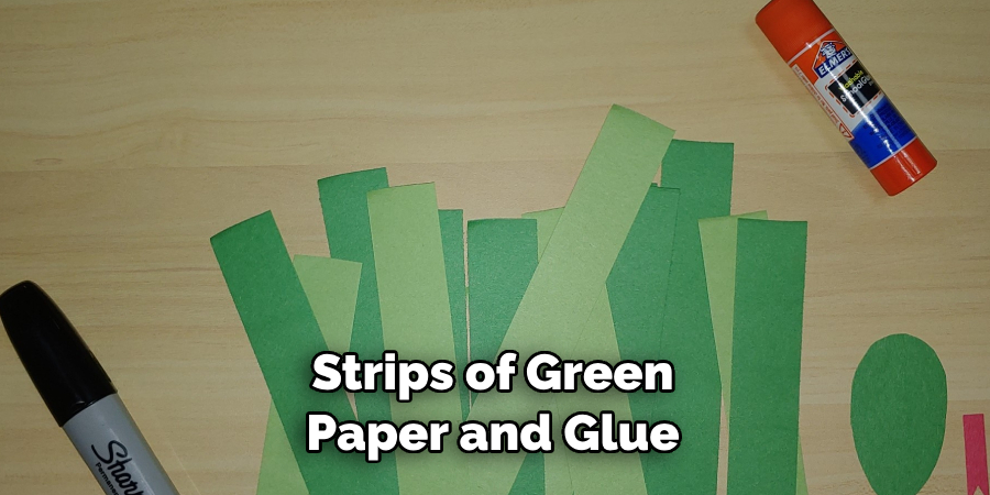 Strips of Green Paper and Glue