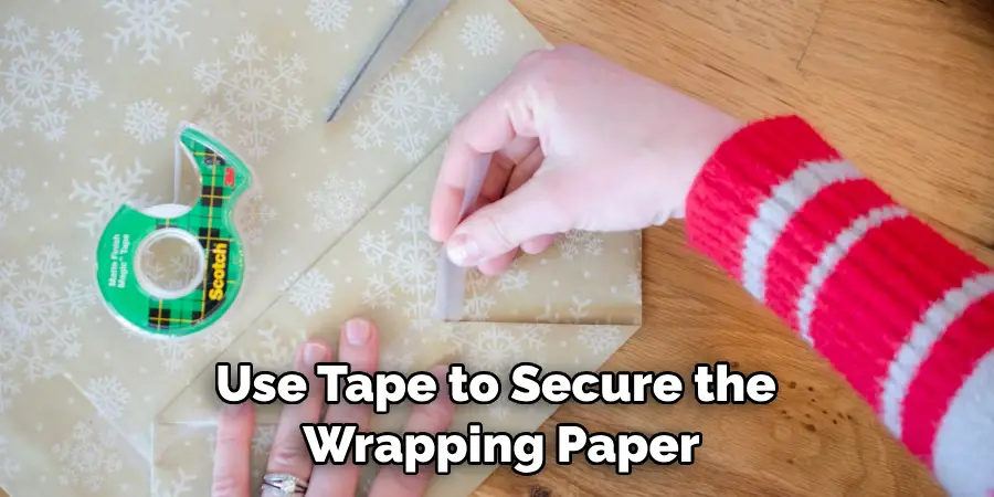 Use Tape to Secure the Wrapping Paper