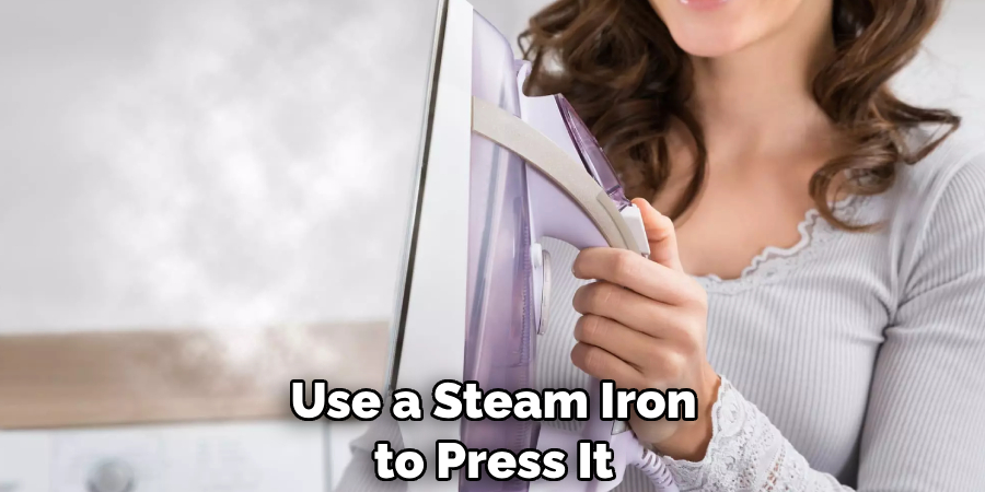Use a Steam Iron to Press It