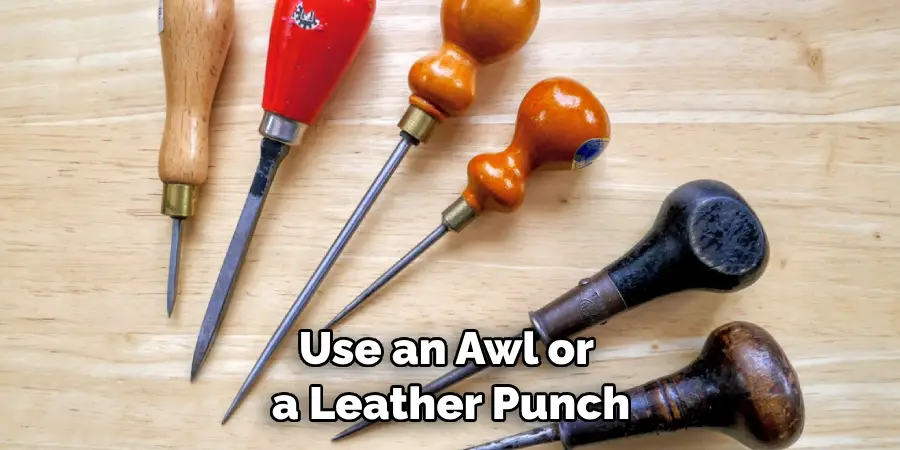Use an Awl or a Leather Punch