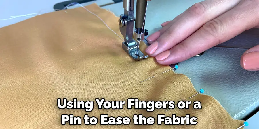 Using Your Fingers or a Pin to Ease the Fabric