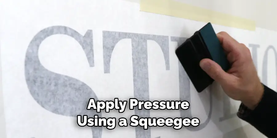 Apply Pressure Using a Squeegee
