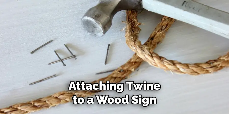 Attaching Twine to a Wood Sign