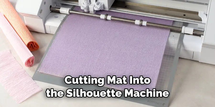 Cutting Mat Into the Silhouette Machine