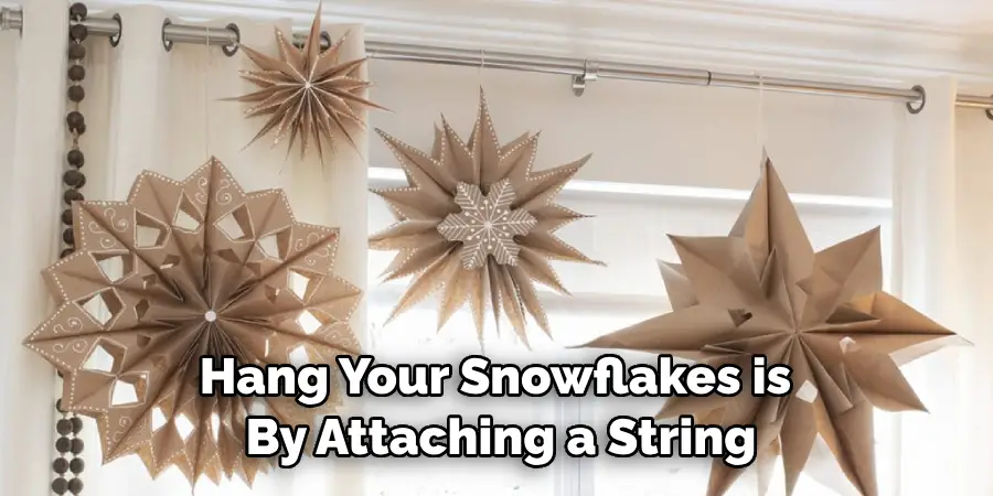 Hang Your Snowflakes is by Attaching a String