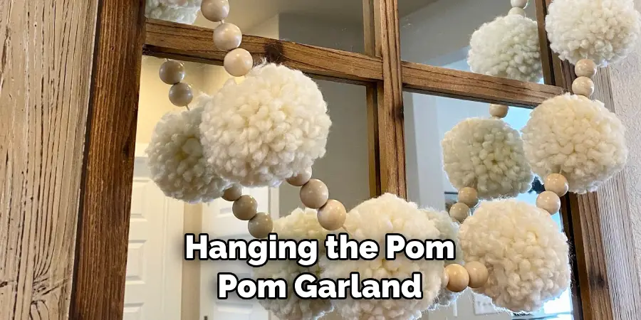 Hanging the Pom Pom Garland