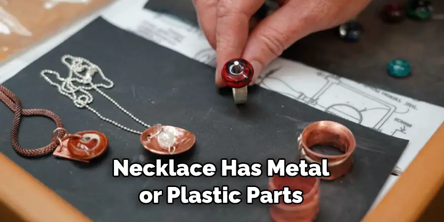 Necklace Has Metal or Plastic Parts