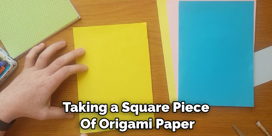 Taking a Square Piece of Origami Paper