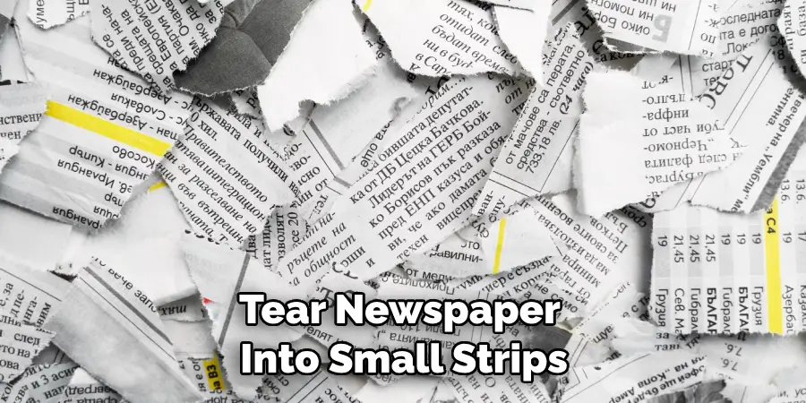 Tear Newspaper Into Small Strips