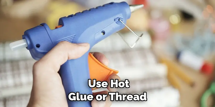 Use Hot Glue or Thread 
