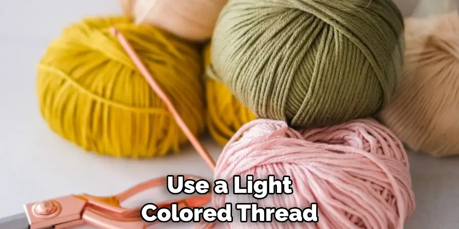 Use a Light Colored Thread