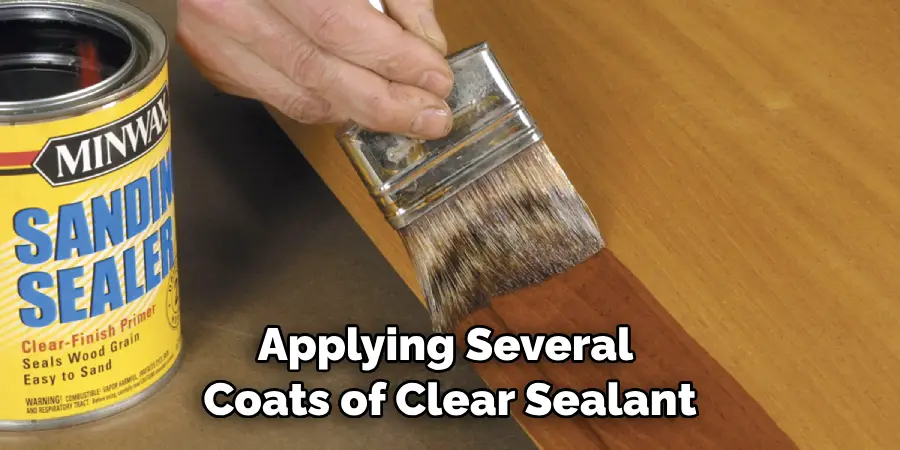 Applying Several Coats of Clear Sealant