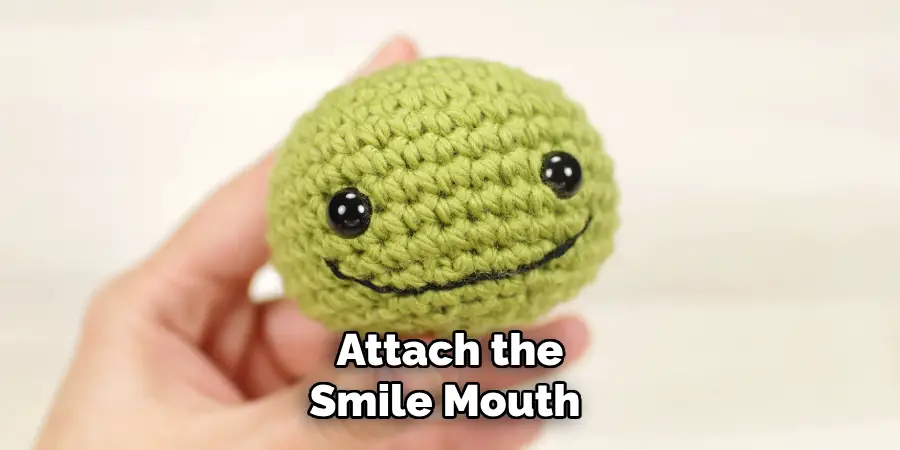 Attach the Smile Mouth 