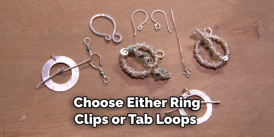  Choose Either Ring Clips or Tab Loops 