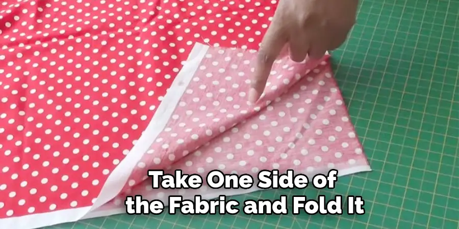Take One Side of the Fabric and Fold It