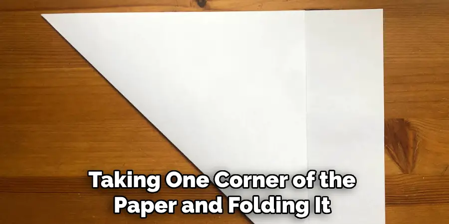 Taking One Corner of the Paper and Folding It