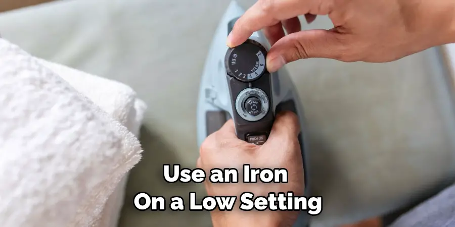 Use an Iron on a Low Setting