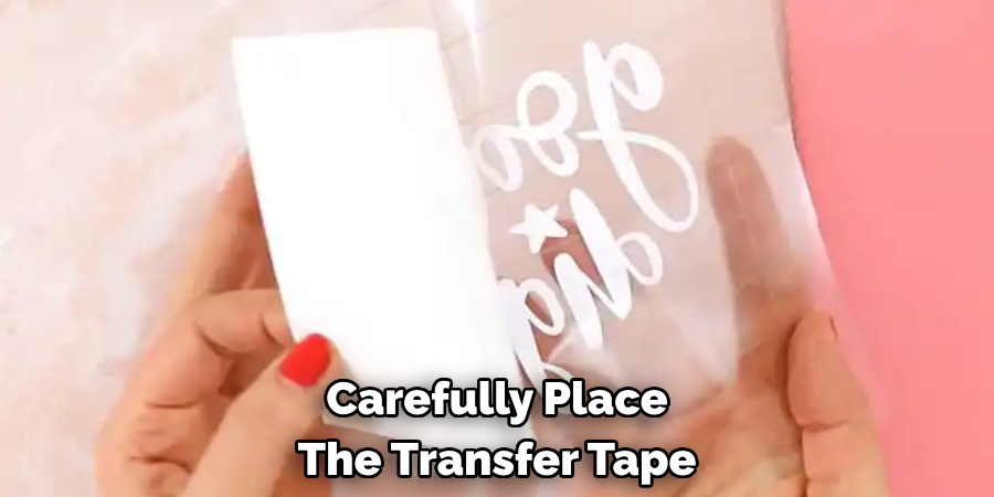 Carefully Place 
The Transfer Tape