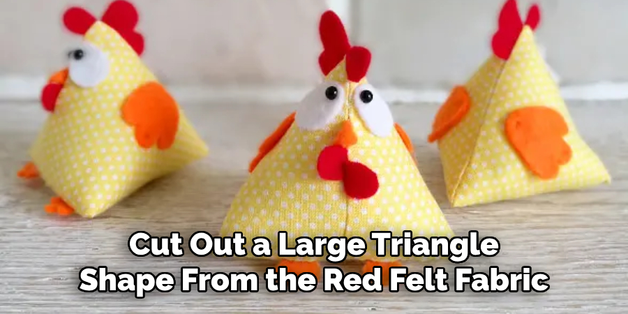 Cut Out a Large Triangle Shape From the Red Felt Fabric