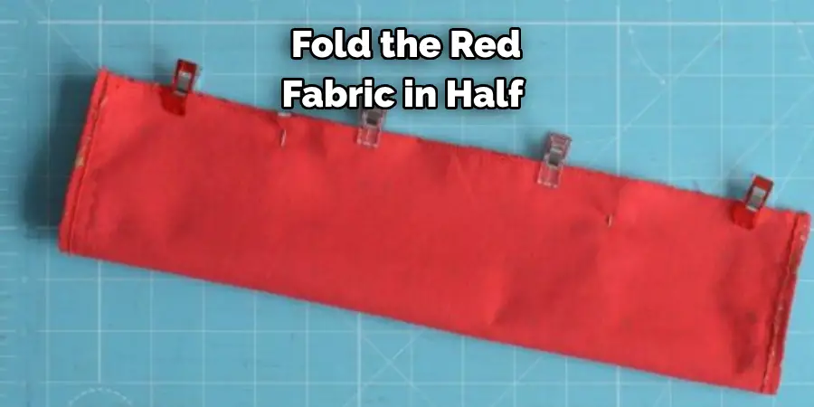 Fold the Red Fabric in Half