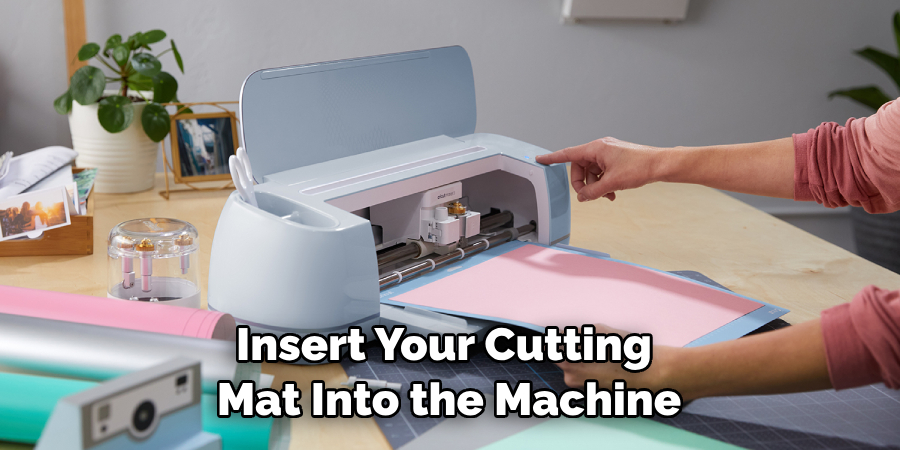 Insert Your Cutting Mat Into the Machine