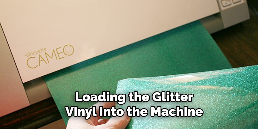 Loading the Glitter Vinyl Into the Machine