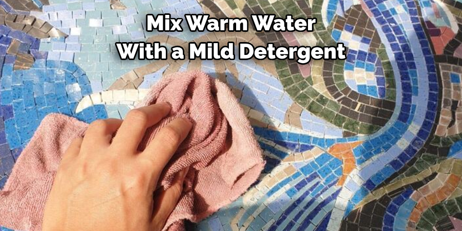 Mix Warm Water 
With a Mild Detergent