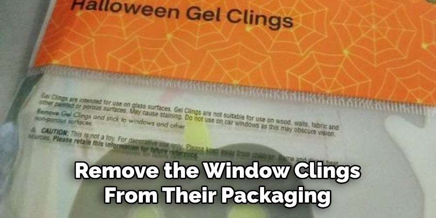 Remove the Window Clings From Their Packaging