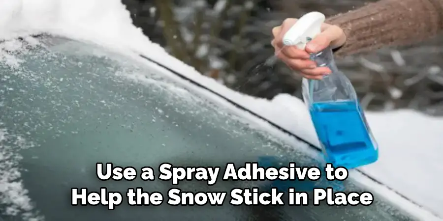 Use a Spray Adhesive to Help the Snow Stick in Place