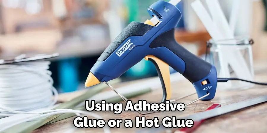  Using Adhesive Glue or a Hot Glue
