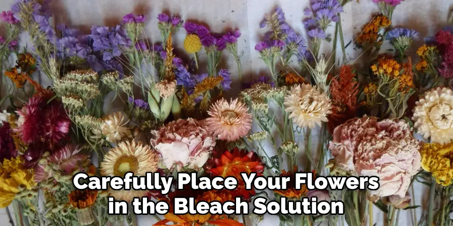 Carefully Place Your Flowers in the Bleach Solution